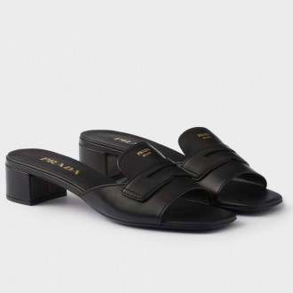 Prada Heeled Slides 35mm in Black Calfskin Prada Heeled Slides 35mm in Black Calfskin