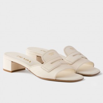 Prada Heeled Slides 35mm in White Calfskin Prada Heeled Slides 35mm in White Calfskin